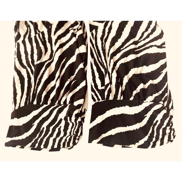 J.T.B. SHORT SLV PULL-OVER RND NECK FRINGE BLOUSE, WOMENS, L, BLACK & TAN ANIMAL - Picture 8 of 9